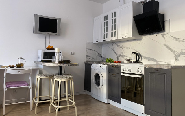 Квартира Современная студия рядом с метро Ул. Дыбенко