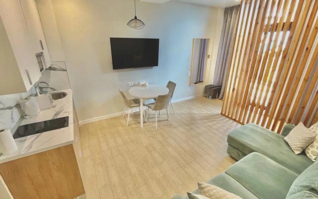 Apartament Green v Rezidentsii Baykalskiye Kholmy