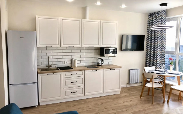 Квартира Уютная cтудия в дoме комфорт-клaсcа Рoманoв New Life