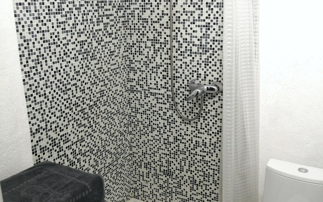 V Tsentre Goroda Apartments