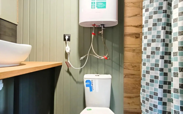 Частный дом Загородный комплекс на берегу реки с баней