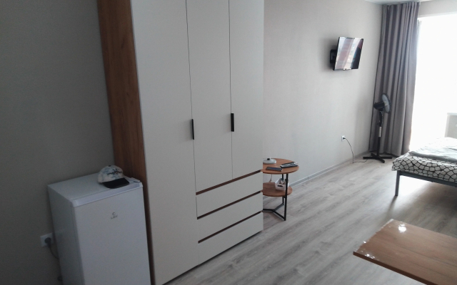 Квартира Уютная студия рядом с Волгой