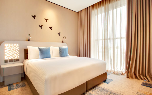 Отель Lemon Tree Hotel Jumeirah Dubai