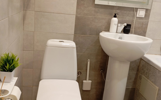 Квартира Уютная студия в рядом с ДРКБ