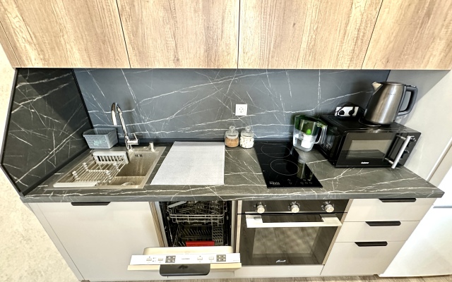 Evkalipt s Dizaynerskim Remontom v Sovremennom Rayone Apartments