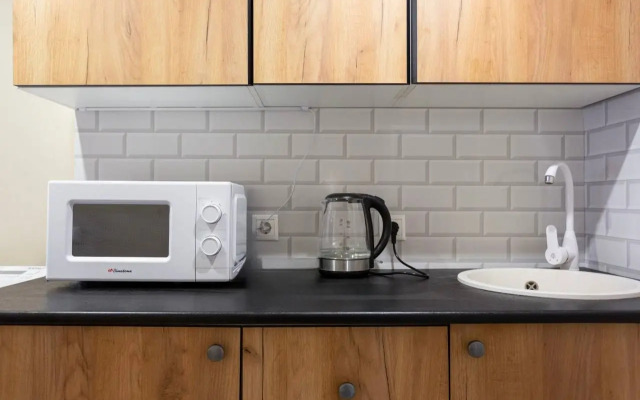 Квартира Уютная студия в современном апарт-комплексе с собственной парковкой