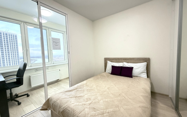 Апартаменты Элитные на берегу реки Тура с видом на Мост Влюбленных