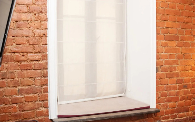 Апартаменты Небольшая стильная студия с видом во двор