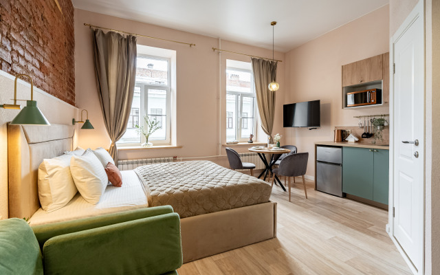 Квартира Яркая студия рядом с Невским Проспектом