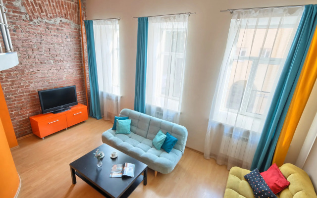 V Tsentre Goroda Apartments