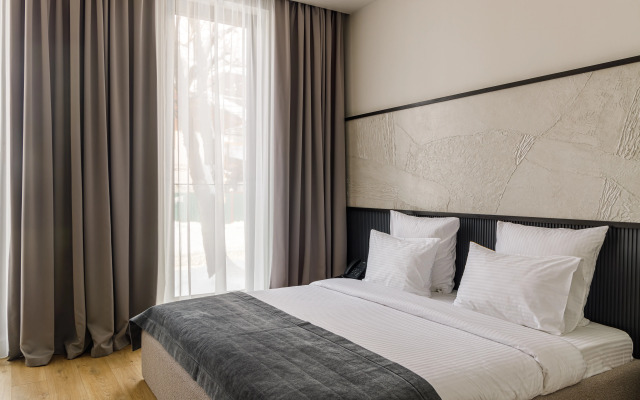 V chetirehzvezdochnom otele Blanc Hill Apartment