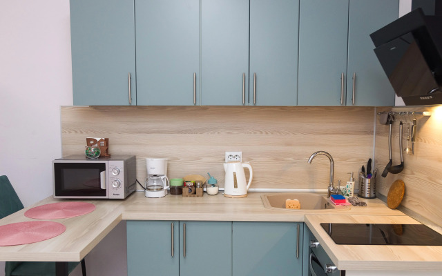Uyutnaya Studiya Rose v PtzHome Flat