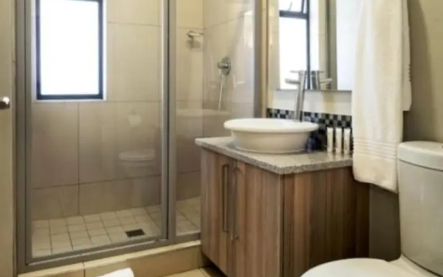 Апартаменты Penthouse Suite  Exquisite One Bedroom Apartment