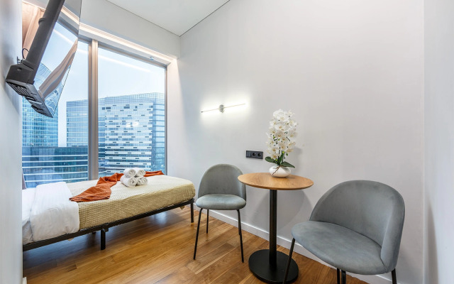 Апартаменты Комфортная студия на 35 этаже башни Оko