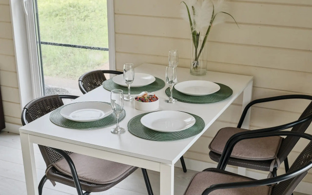 Частный дом с сауной, детской и спортивной площадкой