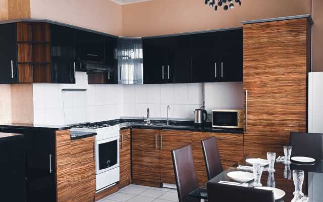 Na Prospekte Kunaeva 36 Blok B Apartments