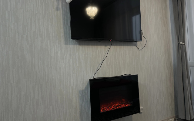 Квартира Студия с камином у парка