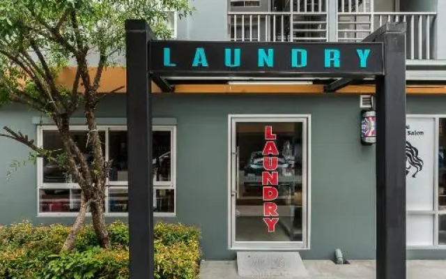 Отель The Grass Serviced Suites