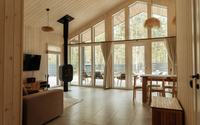 Частный дом Барнхаус в стиле бохо в сосновом лесу