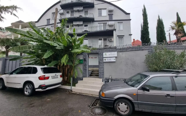 V Tsentre Goroda Apartments