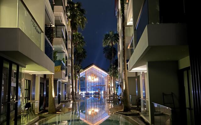 Апартаменты Palmyrah Surin Beach Residences