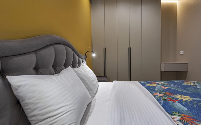 V Tsentre Goroda Apartments