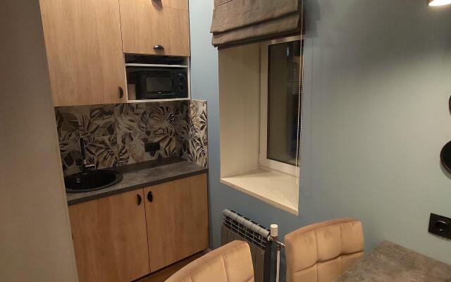 V Tsentre Goroda Apartments