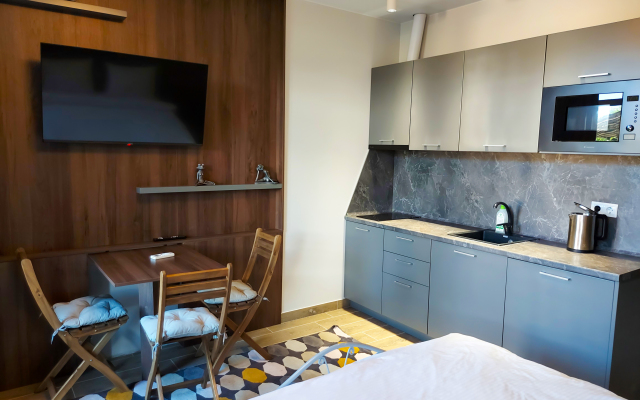 Апартаменты Уютная студия у Олимпийского парка