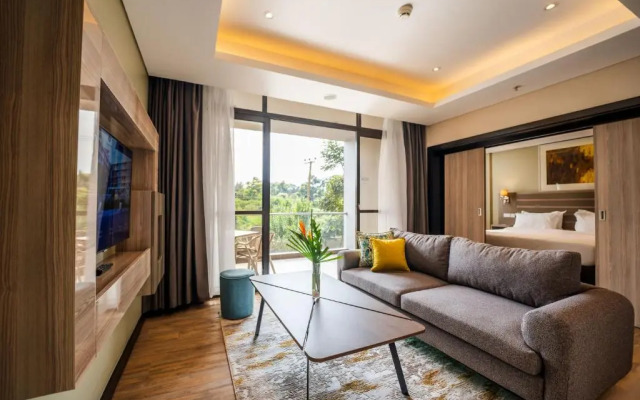 Отель Trademark Suites at Enaki Town