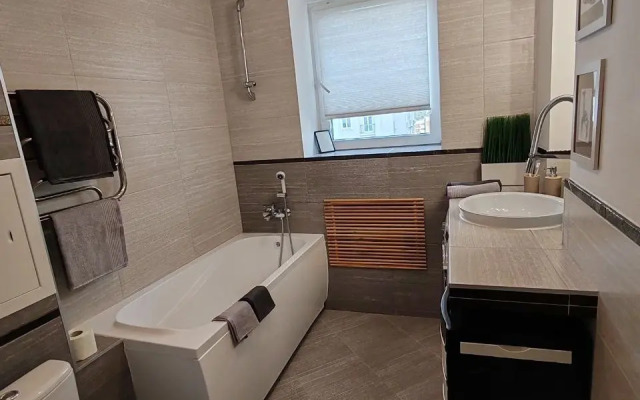 Stilnaya komfortnaya studiya dlya nezabyvaemogo otdykh Apartments