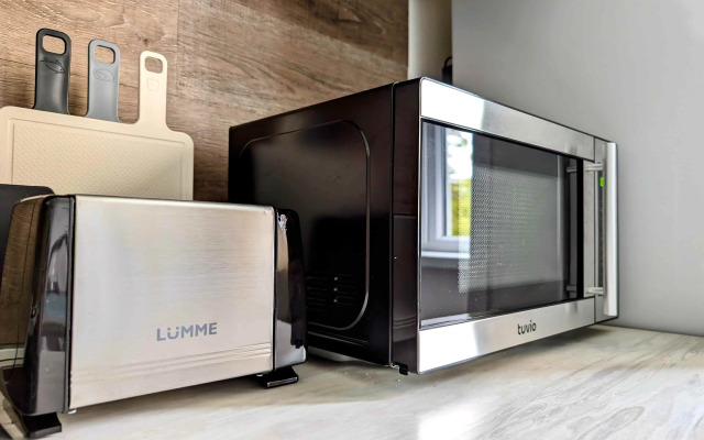 Апартаменты Новые в тихом центре и хвойным лесом за окном