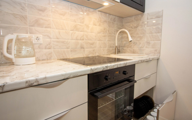 Uyutnaya Studiya V Novom Dome Apartments