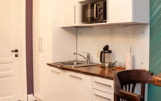 Апартаменты Семейная студия с видом в уютный двор