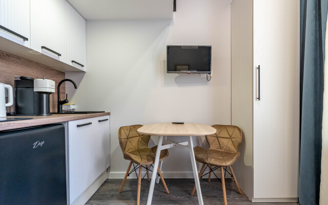 Апартаменты Уютная Двухуровневая Квартира Студия в Центре Города