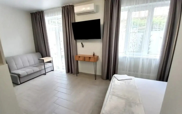 Апартаменты Уютная Студия в центре