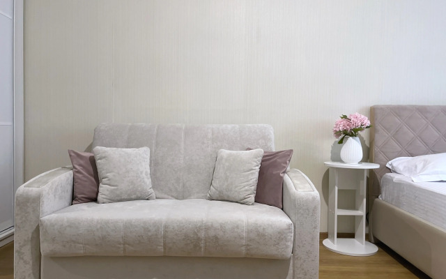 V Tsentre Goroda Apartments