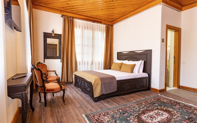 Отель WOO Town Suites