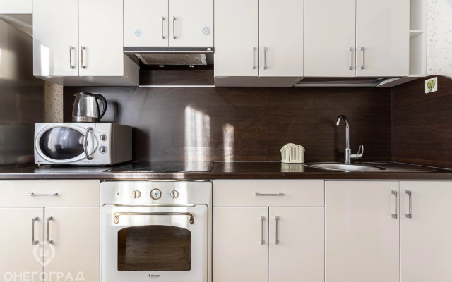 Апартаменты ОнегоГрад У Лотос Плазы