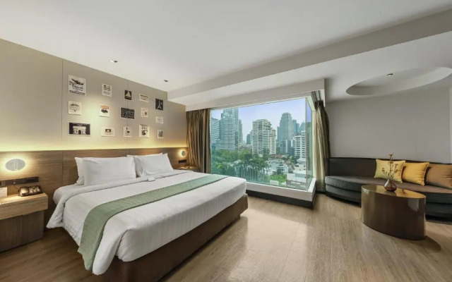 Отель Golden Tulip Mandison Suites