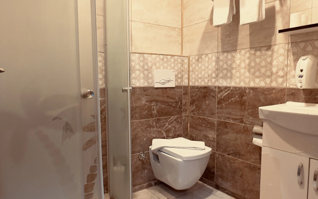 Отель Mitra Downtown