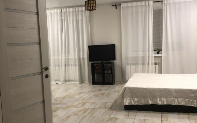 Квартира Уютная студия возле Волги