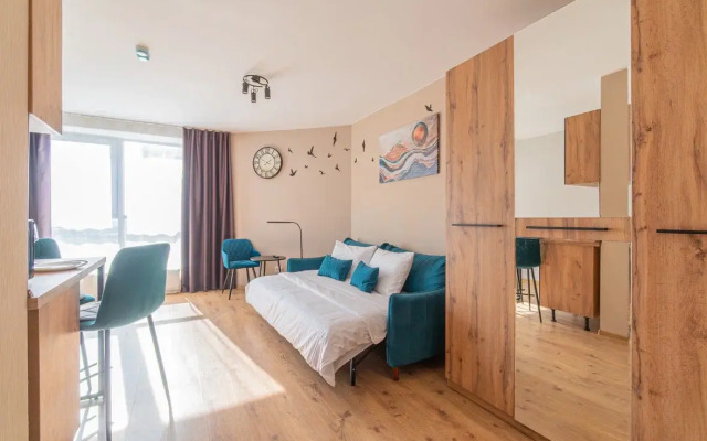 Апартаменты Просторная Студия у Метро Парнас