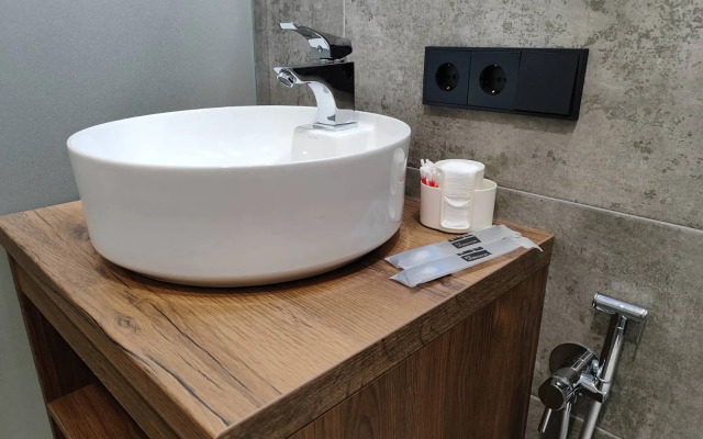 Апартаменты Уютная студия с панорамной лоджией с бесконтактным заселением