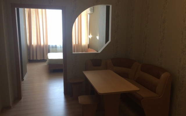 V Tsentre Goroda Apartments