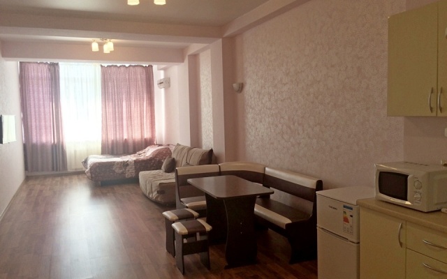 V Tsentre Goroda Apartments