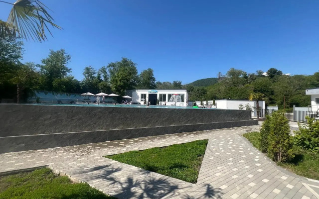 Uyutnaya Studiya S Basseynom Na Territorii Apartments