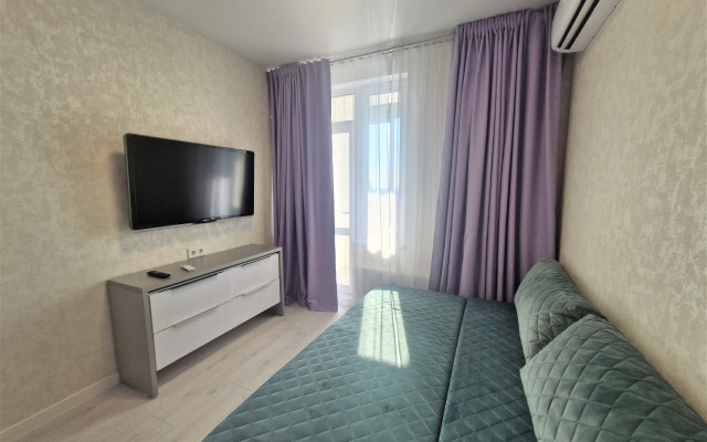 Uyutnaya studiya v tsentre na Kargina Apartments