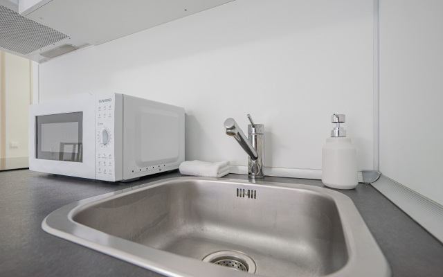 Uyutnaya Studiya na Kosmonavtov Apartments