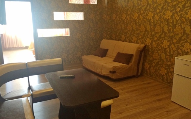 V Tsentre Goroda Apartments