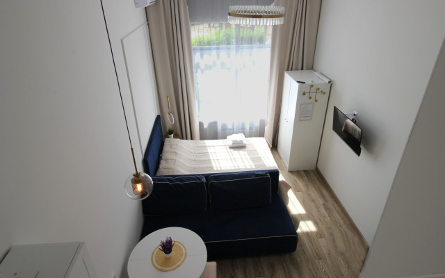 Studiya dvuhurovnevaya Apartments